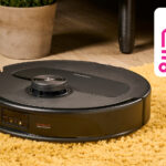 Roborock robot vacuum on carpet next to Smart Home Week graphic