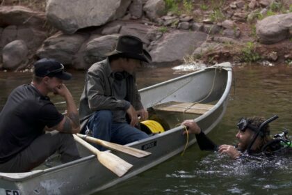 Chad Ollinger prepares to dive into the underwater tunnel in Mystery at Blind Frog Ranch season 5