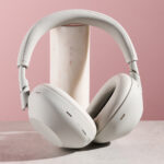 Sony WH-1000XM6 leaning on pole