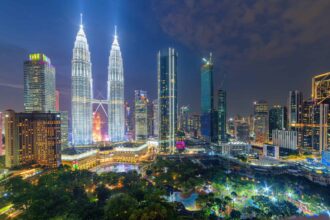 An expanding and diversifying economy is attracting foreign investors to the peninsular nation. Proximity to pricey Singapore helps.