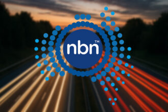 NBN Co logo on a background comprising light trails on a motorway.