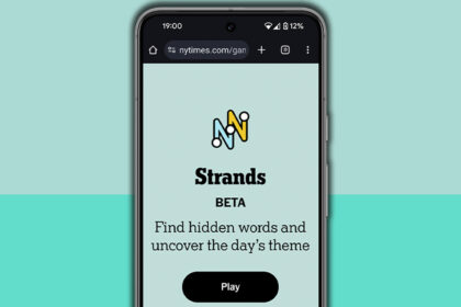 NYT Strands homescreen on a mobile phone screen, on a light blue background