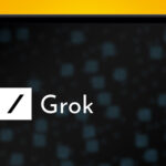A laptop on an orange background showing the xAI Grok logo