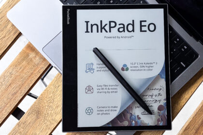 PocketBook InkPad Eo with its stylus on a laptop