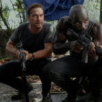 Gerard Butler and Mike Colter in a scene from Plane