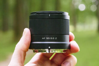 Viltrox AF 50mm F2 Air lens in the hand