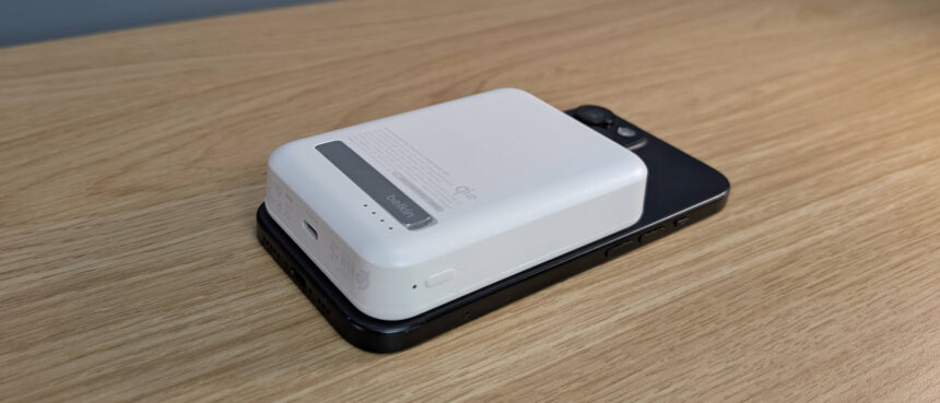 Belkin Boostcharge Pro 15W qi2 power bank sitting on an iPhone 15