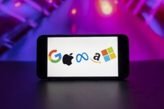 In this photo illustration, the big tech companies Google, Apple, Meta, Amazon, Microsoft logos seen displayed on a mobile phone screen.