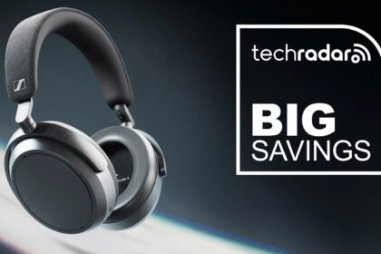 Sennheiser Momentum 4 Wireless in Graphite on a dark blue background, with &quot;Big Savings&quot; text in white.