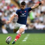 Nolann Le Garrec kicks a conversion off the tee in a match against England Rugby.
