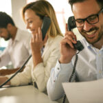 A person making a sales call in an office.