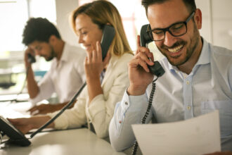 A person making a sales call in an office.