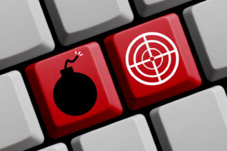 A bomb and crosshair on a keyboard.