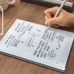 A person writing on the ViWoods AiPaper productivity tablet with a TechRadar deals inset saying &quot;don't miss&quot;