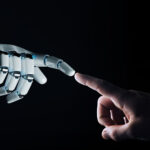 Robot hand making contact with human hand on dark background 3D rendering