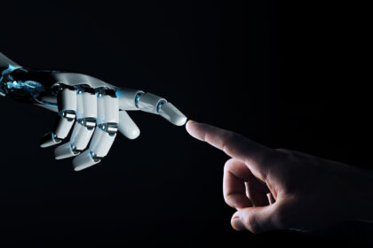 Robot hand making contact with human hand on dark background 3D rendering