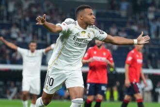 Kylian Mbappé of Real Madrid celebrates scoring his team's first goal the LaLiga EA Sports match between Real Madrid CF and CA Osasuna at Estadio Santiago Bernabeu on August 19, 2025 in Madrid, Spain.