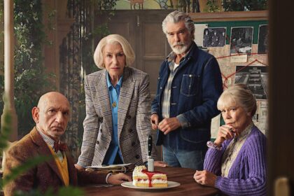 Helen Mirren, Pierce Brosnan, Ben Kingsley and Celia Imrie sit around a table with a slice of cake that has a knife in it at the center