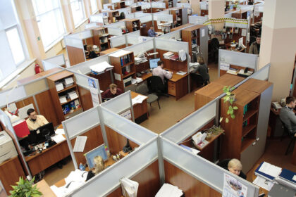 office workers in pods