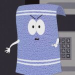 Towelie looking angry while standing in front of a keypad