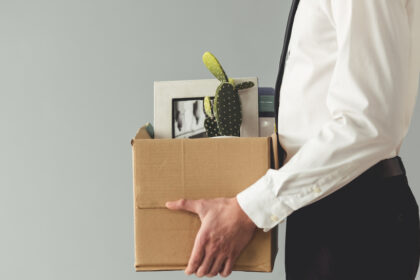 Fired worker with packed box