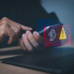 Users display warnings about the use of artificial intelligence (AI), access to malicious software or threats to online hackers. computer cyber security Warning concept or tech scam.