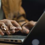 Data Search Technology Search Engine Optimization. man's hands are using laptop to Searching for information. Marketing ranking traffic website, SEO search engine optimization concept.