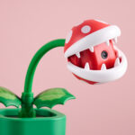 Hori Piranha Plant Camera for Nintendo Switch 2 with mouth open on pink background