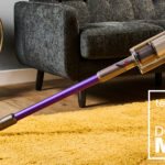 Dyson Gen5 Detect vacuum cleaner being used on a yellow rug