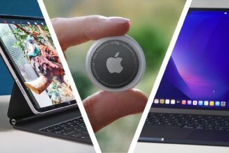 An iPad Pro next to a hand holding an Apple AirTag and a MacBook Pro on a table