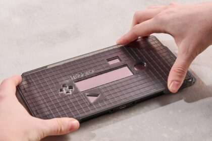 Person holding application frame on the Genki Aegis Shield