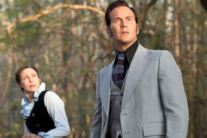 Ed and Lorraine Warren look on in disbelief at someone off camera in The Conjuring
