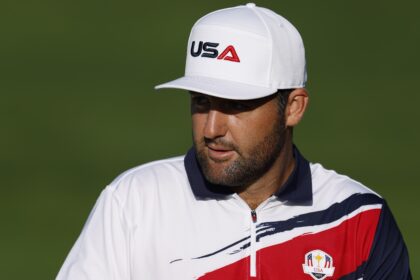Scottie Scheffler of Team United States looks across the practice range prior to the Ryder Cup 2025 at Black Course at Bethpage State Park Golf Course on September 22, 2025 in Farmingdale, New York.