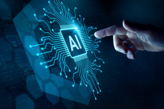 A hand reaching out to touch a futuristic rendering of an AI processor.