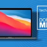 An Apple MacBook Air M1 against a blue techradar DON'T MISS background