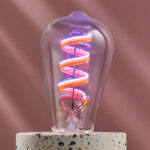 The LEDs in the WiZ filament bulb are lit up in various colors.