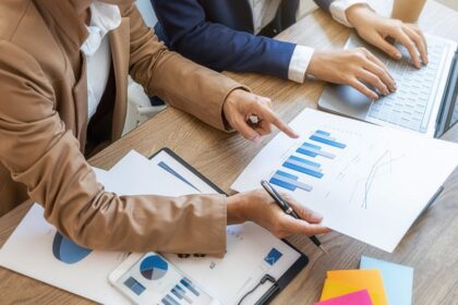 People studying a report.