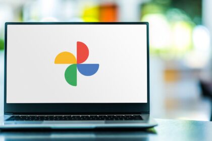 Google Photos logo displayed on a laptop