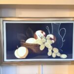 Samsung The Frame TV showing still life painting