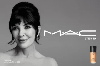 Kris Jenner posing for her official MAC Cosmetics campaign poster, wearing glamorous makeup and stylish outfit.