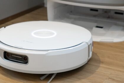 Narwal Flow robot vacuum next to its base