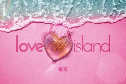 Love Island logo floating in the sea during a sunny day.