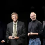 A group of tech billionaires posing against a black background, looking serious and contemplative.