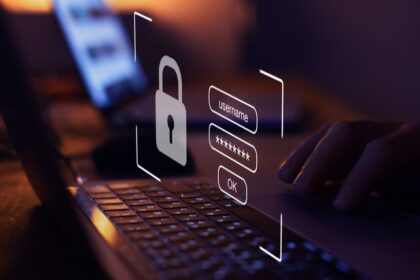 A cybersecurity icon projecting from a laptop screen.