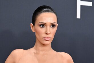 Bianca Censori posing on the red carpet.