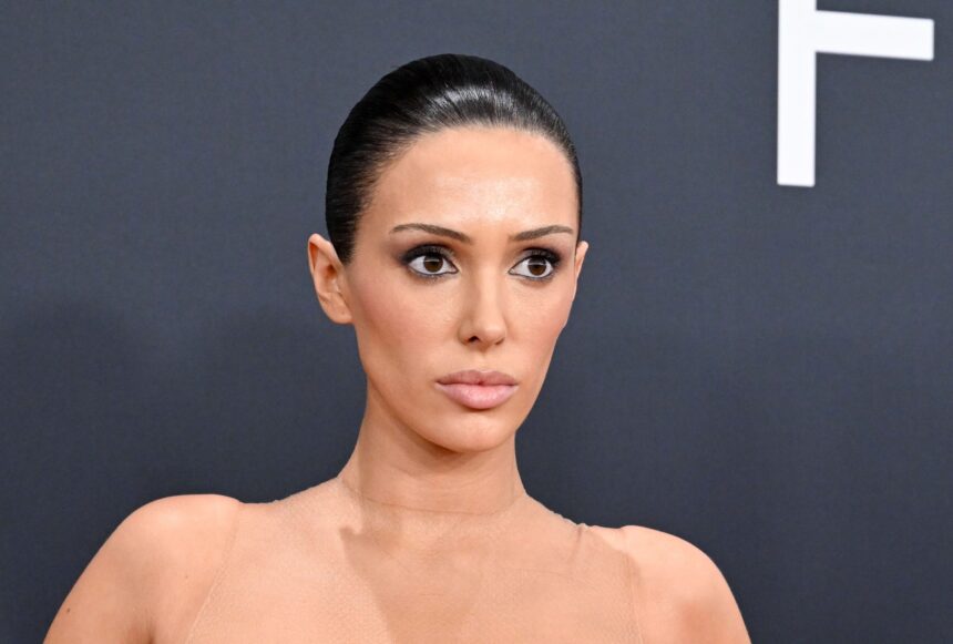 Bianca Censori posing on the red carpet.