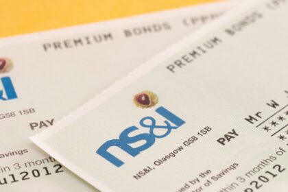 NS&I Premium Bonds documents showing bond numbers and prize information for UK savers.