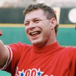 Lenny Dykstra smiling and laughing on the field during his Major League Baseball career, showing his energetic and charismatic personality.