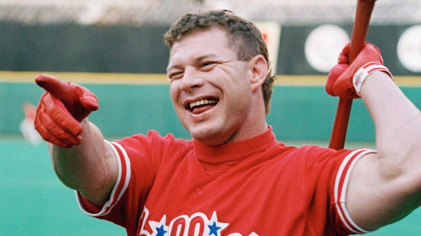 Lenny Dykstra smiling and laughing on the field during his Major League Baseball career, showing his energetic and charismatic personality.